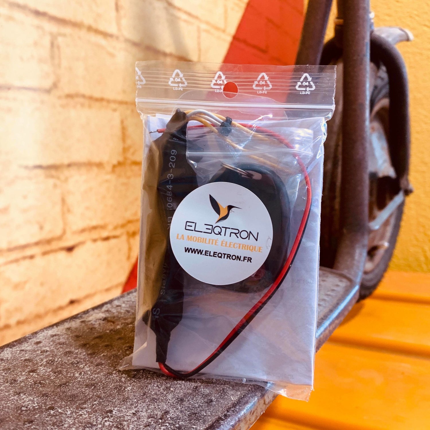 Bridage pour trottinette électrique